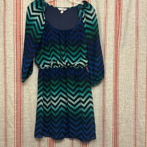 Blue and green and patterned dress. Mid sleeve